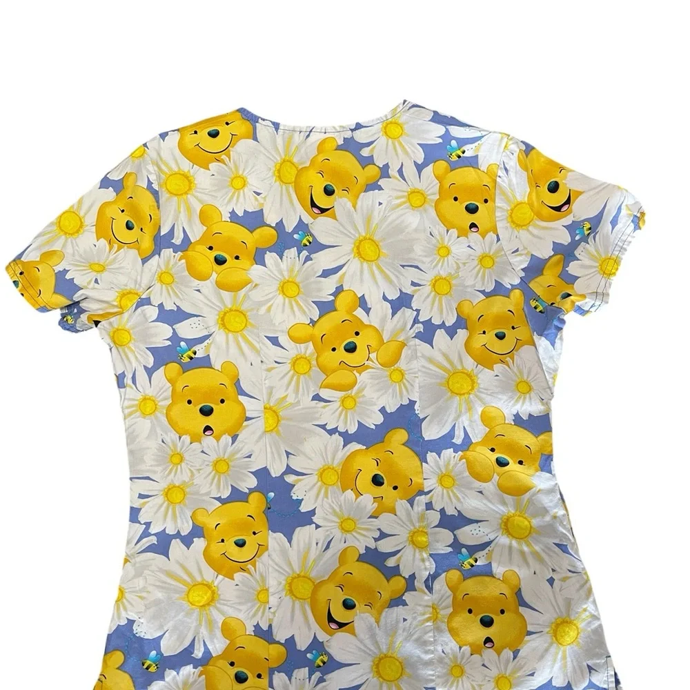 Disney Blue and Yellow Floral Print Adult Woman’s Scrub.
Size S - Picture 2 of 13